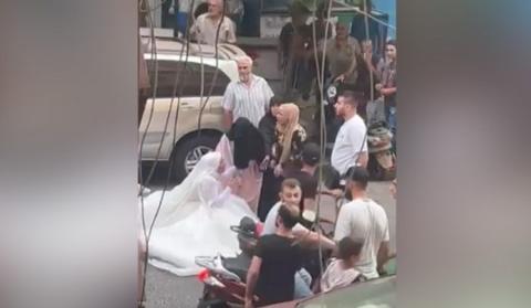 عروس لبنانية تنهار يوم زفافها وسط الشارع.. أخو